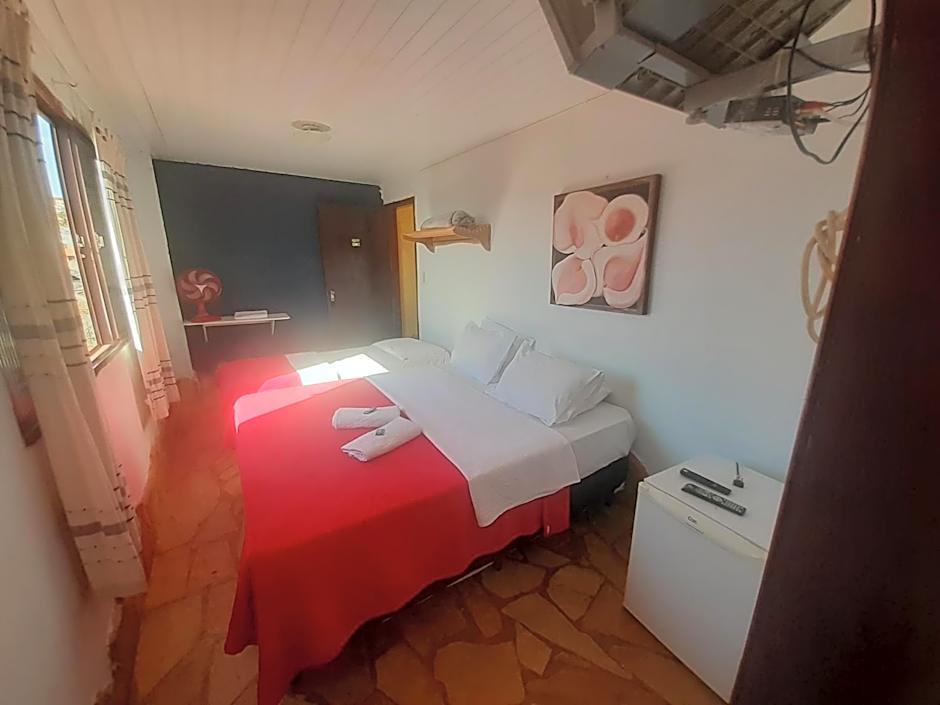 Quarto da Aliens Palace Hotel